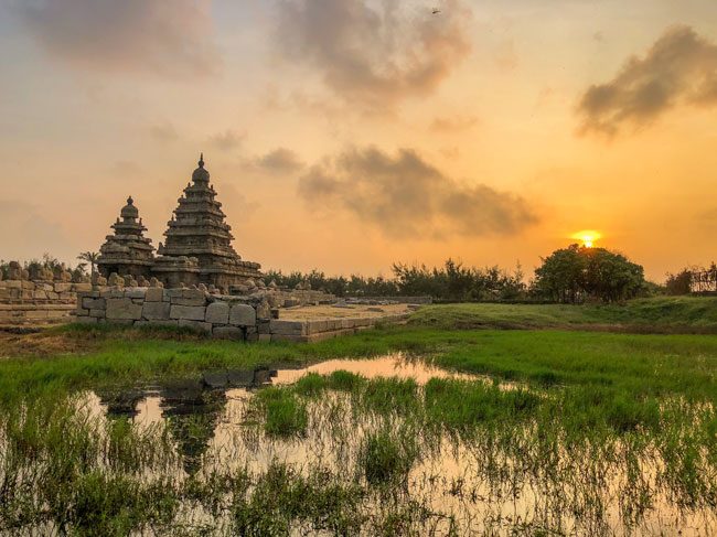 The Shore Temple at sunset, seen across the wetlands near Alai Osai
